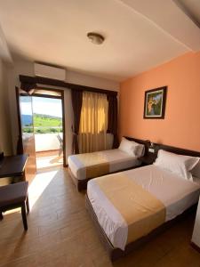 Postel nebo postele na pokoji v ubytování Hotel Chaouen