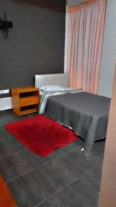 En eller flere senge i et værelse på Residencial Misky dreams + 24 billeder