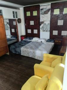 En eller flere senge i et værelse på Residencial Misky dreams