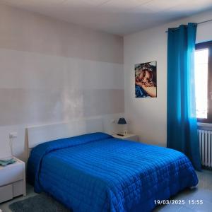 Postel nebo postele na pokoji v ubytování Casapatrizia B&B Sirmione