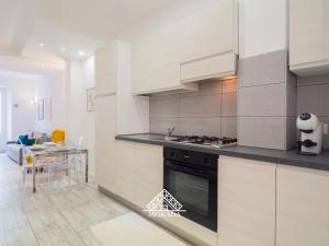Η κουζίνα ή μικρή κουζίνα στο Casa Pintadera - MORADA +6 φωτογραφίες