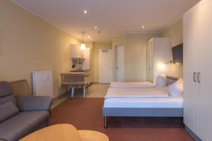 Postel nebo postele na pokoji v ubytování Strandläufer Classic 212 + 12 fotografií