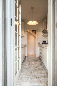 Virtuvė arba virtuvėlė apgyvendinimo įstaigoje Holiday home Villetta Cinquale