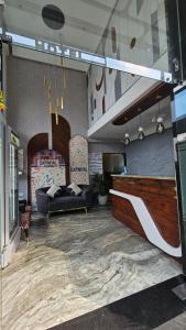 Ruang duduk di Hotel Carnival , Vijay Nagar Indore +4 gambar