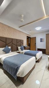 Katil atau katil-katil dalam bilik di Hotel Carnival , Vijay Nagar Indore