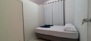 Voodi või voodid majutusasutuse Apartamento 06 toas