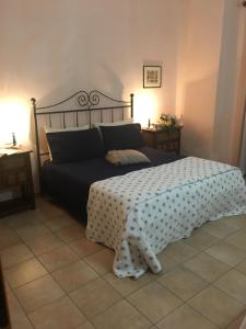 A bed or beds in a room at Tenuta Saracone