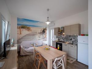 Kuchyň nebo kuchyňský kout v ubytování Casa Luri Porto Cesareo NordSudCasaVacanza