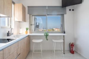 Dapur atau dapur kecil di Crabstone Brand New Complex with Pool
