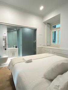 Postel nebo postele na pokoji v ubytování Apartamento no centro de Lisboa