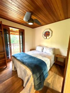 Una cama o camas en una habitación de Casa das Estrelas