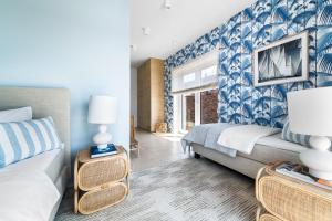 Llit o llits en una habitació de Luxus Beachvilla The View Plus