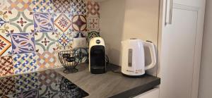 Η κουζίνα ή μικρή κουζίνα στο Sweet Loft in posizione favolosa