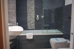 A bathroom at Best Western Mirage Hotel Fiera
