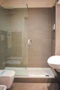 A bathroom at Best Western Mirage Hotel Fiera