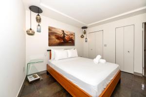 Кровать или кровати в номере Sobe Apartments