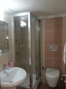 Koupelna v ubytování Hosta Otel