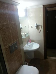 Koupelna v ubytování Hosta Otel