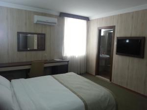TV a/nebo společenská místnost v ubytování Hosta Otel