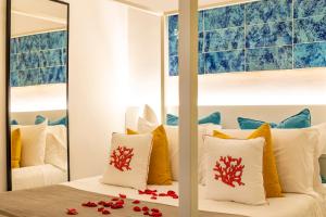 Voodi või voodid majutusasutuse Suite Apartment Capri con Jacuzzi in Piazzetta toas