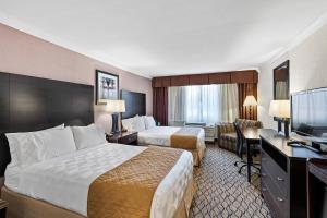 Postel nebo postele na pokoji v ubytování Executive Inn - Fort Lee