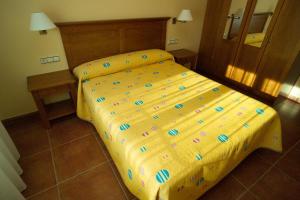 Postel nebo postele na pokoji v ubytování Apartamentos Turmo