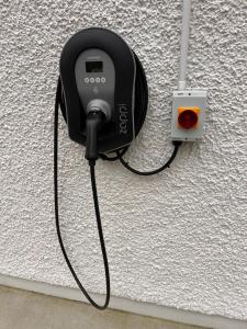 a game controller is plugged into a wall at Fintra Bay Hideaway in Killybegs