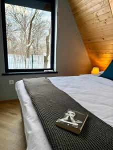 Postel nebo postele na pokoji v ubytování AHA Cabin