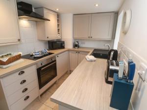 Kuchyň nebo kuchyňský kout v ubytování Anneth Lowen