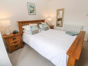 Postel nebo postele na pokoji v ubytování Anneth Lowen