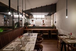Reštaurácia alebo iné gastronomické zariadenie v ubytovaní Locanda Remare