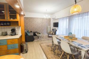 Kuchyň nebo kuchyňský kout v ubytování Stylish apt in Athens center