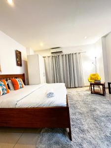 Postel nebo postele na pokoji v ubytování Serenity luxury homes at Gallery