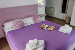 Postel nebo postele na pokoji v ubytování Antares Rooms