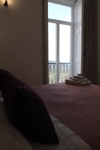 Postel nebo postele na pokoji v ubytování Antares Rooms