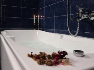 a pile of debris sitting on top of a bath tub at Villa dei Macchini in Chiusi della Verna +35 photos