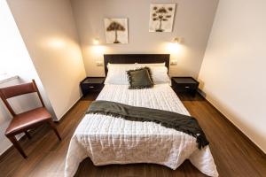Postel nebo postele na pokoji v ubytování Casa Barreiro Piedra