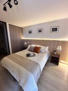 Ένα ή περισσότερα κρεβάτια σε δωμάτιο στο Wonderlust Apartments El Ovejero