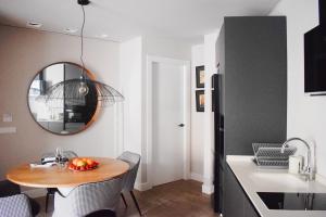 Kuchyň nebo kuchyňský kout v ubytování Valencia Apartamentos Goya + 37 fotografií