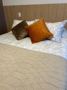Ένα ή περισσότερα κρεβάτια σε δωμάτιο στο Wonderlust Apartments El Ovejero +14 φωτογραφίες