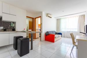 Køkken eller tekøkken på Premier 215 - LakeSide - Stúdio Amanhecer - Beira Lago - By Hospede Fácil