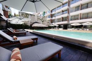 Bazén v ubytování Holiday Inn Tulum by IHG nebo v jeho okolí