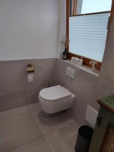 Koupelna v ubytování Holly-WOOD Allgäu Ferienwohnung