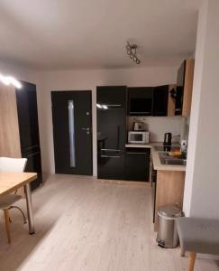 Kuchyň nebo kuchyňský kout v ubytování Ferienwohnung Weserflair nähe Herzzentrum