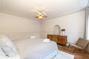 Postel nebo postele na pokoji v ubytování Cosy Suite