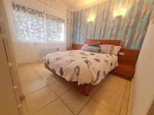 Posteľ alebo postele v izbe v ubytovaní Apartament en Platja d'Aro al lado del mar