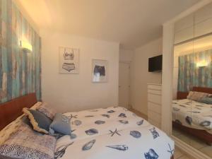 Posteľ alebo postele v izbe v ubytovaní Apartament en Platja d'Aro al lado del mar