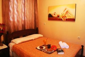 A bed or beds in a room at Porofarago