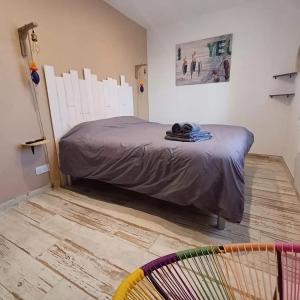 Ένα ή περισσότερα κρεβάτια σε δωμάτιο στο Villa spacieuse avec piscine privée à L'Île-d'Yeu – 150 m² +24 φωτογραφίες