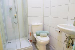 Koupelna v ubytování J Martins ApartHotel + 14 fotografií
